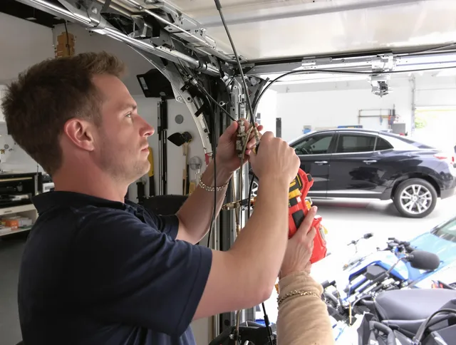 Miami Beach Garage Door Repair safety certified technician performing cable replacement in Miami Beach