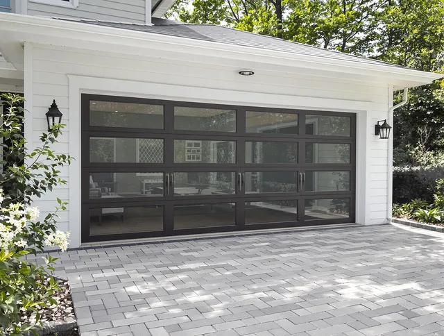 Miami Beach Garage Door Repair design specialist presenting custom garage door options to Miami Beach homeowner