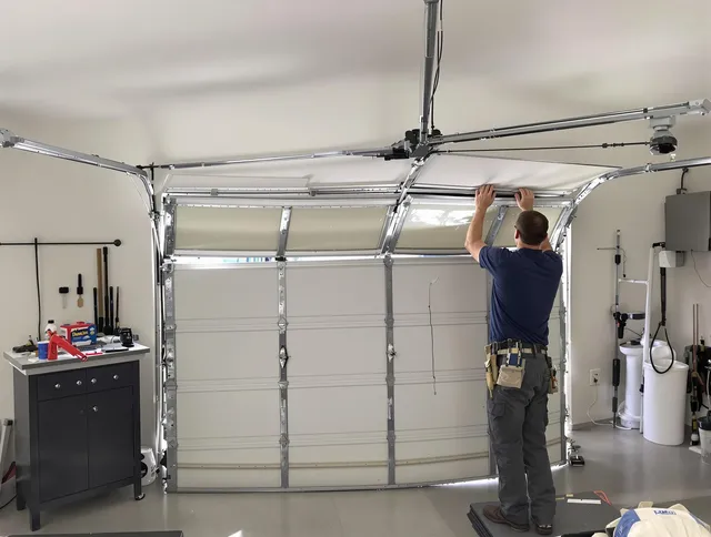 Miami Beach Garage Door Repair specialist performing precise section replacement on Miami Beach garage door