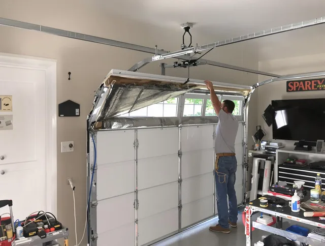 Garage door section replacement by Miami Beach Garage Door Repair in Miami Beach